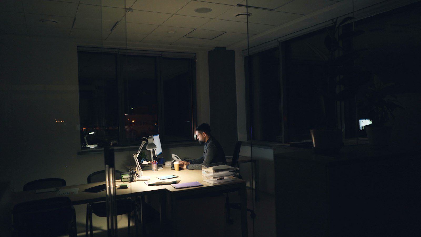 An office at night with a city view